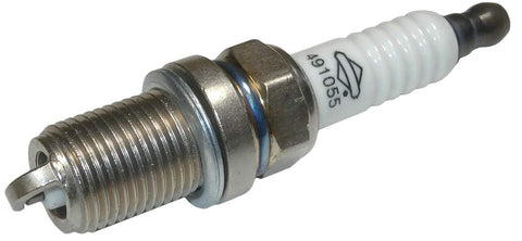 Briggs and Stratton 491055T spark plug installed in small engine, easy replacement.