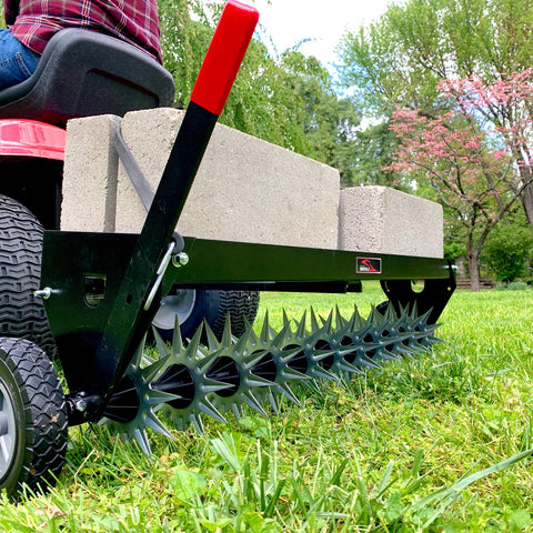 Brinly SAT2-40BH-P aerator in action delivers uniform lawn aeration