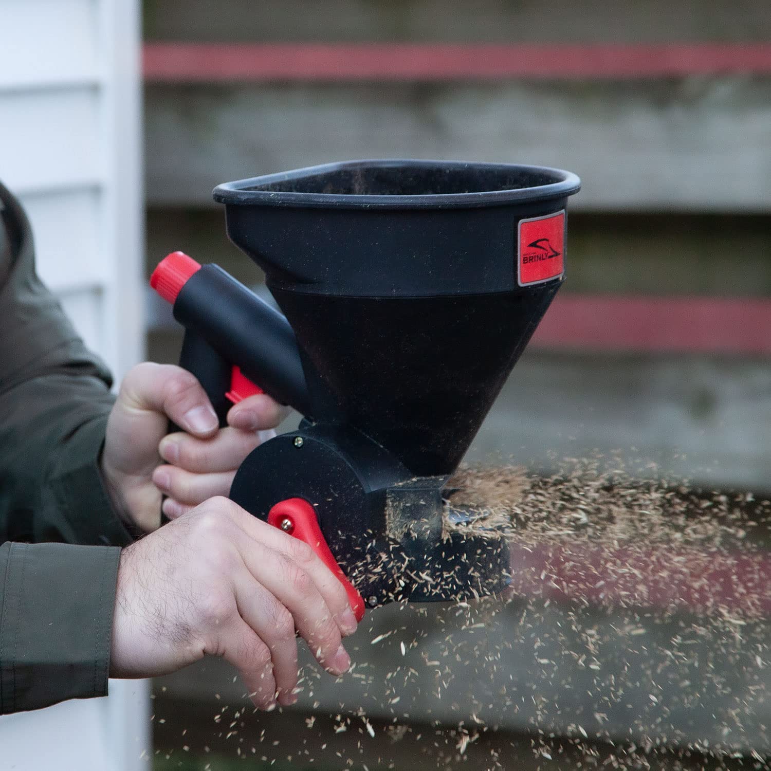 Brinly durable poly hopper resists impact in outdoor conditions.