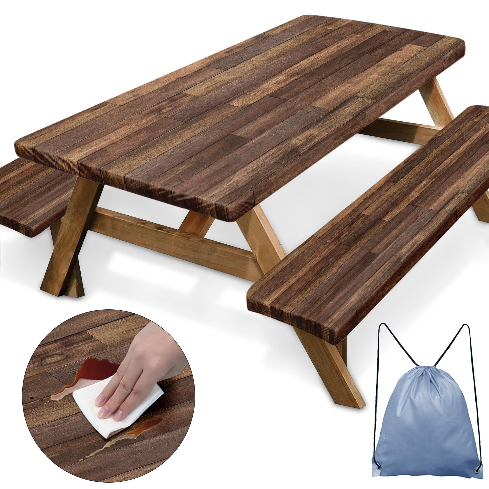 Britown picnic table cover with elastic edges on brown wood beside a campsite