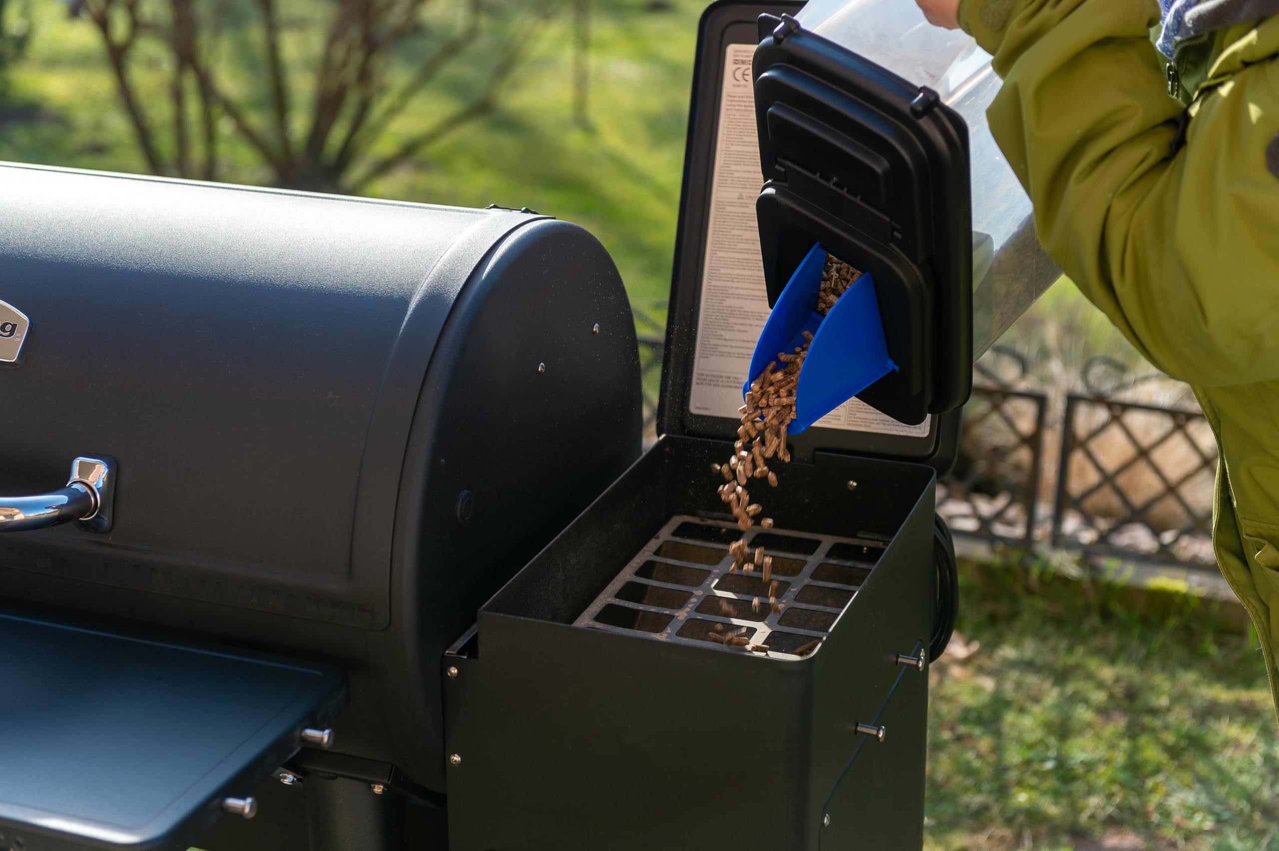 Broil King 66900 pellet storage bin dump-out hatch use for pellet collection