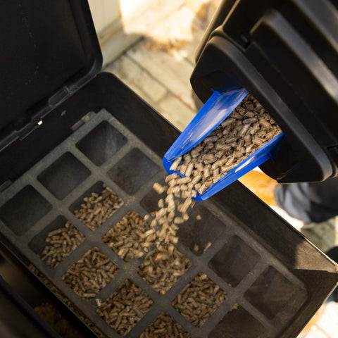 Broil King 66900 pellet storage bin under hopper keeps pellets ready
