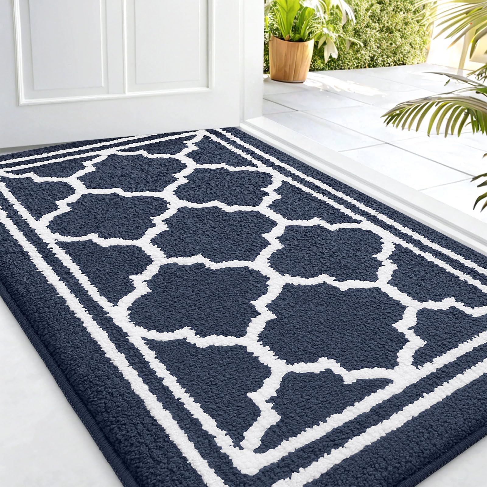 Buganda indoor doormat with dirt-trapping surface keeps entryways clean and dry