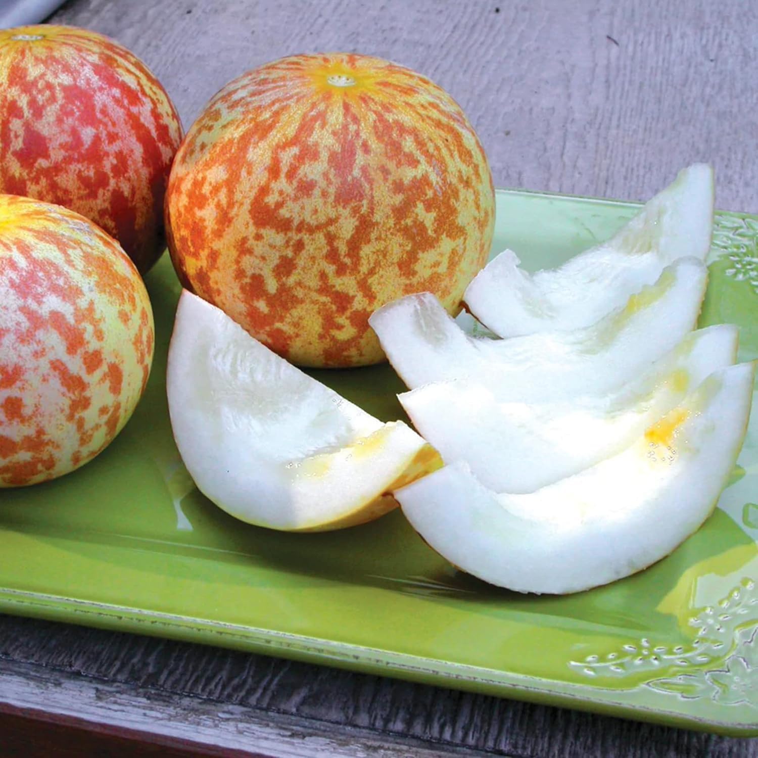 BuggyBeds striped melon fruit with white flesh, great for fresh slices.