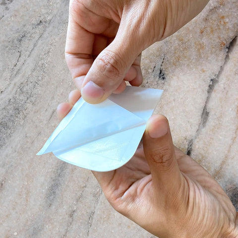 Close-up of BugMD refiller pad showing dense adhesive surface that traps pests