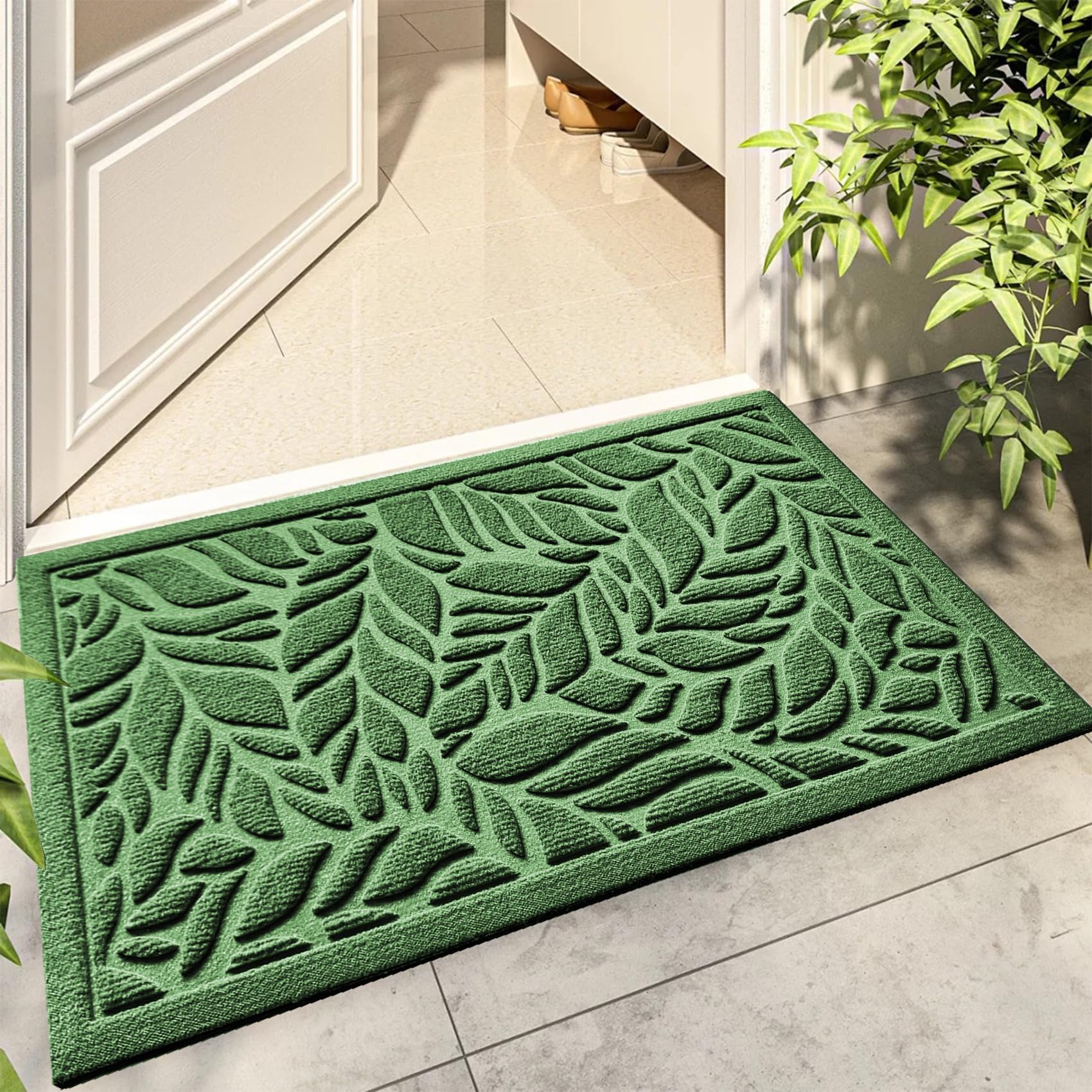 Bulijojo front door mat with green leaves design; absorbs moisture and traps dirt to keep entrances cleaner.