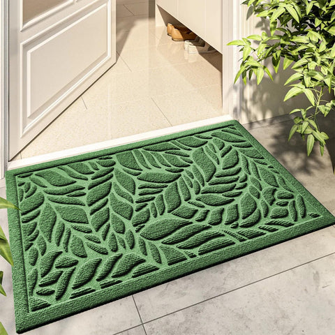 Bulijojo front door mat with green leaves design; absorbs moisture and traps dirt to keep entrances cleaner.