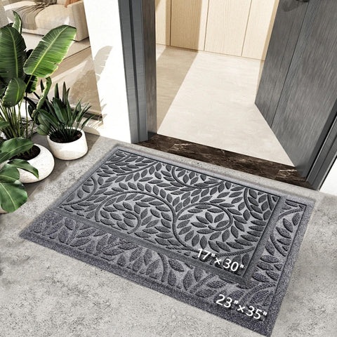 Patterned groove design scrapes dirt and moisture at the doorway.