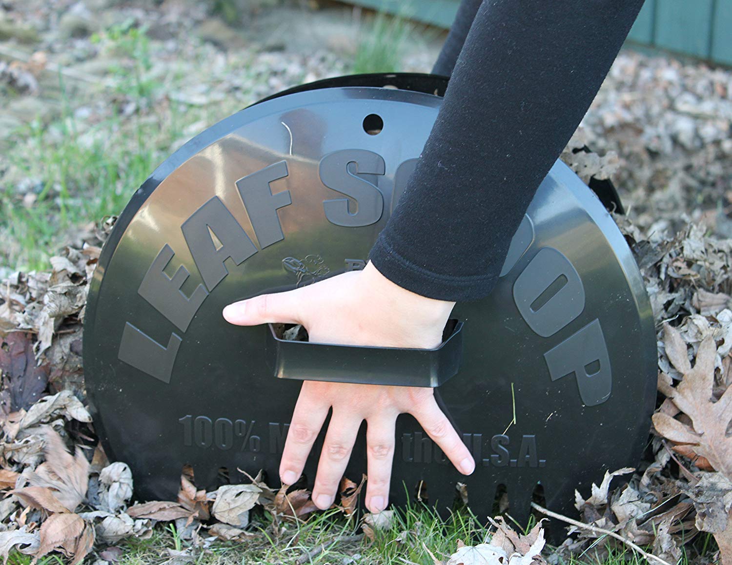 Bully Tools Poly Leaf Scoop highlighting ergonomic handle for comfortable grip during yard cleanup.