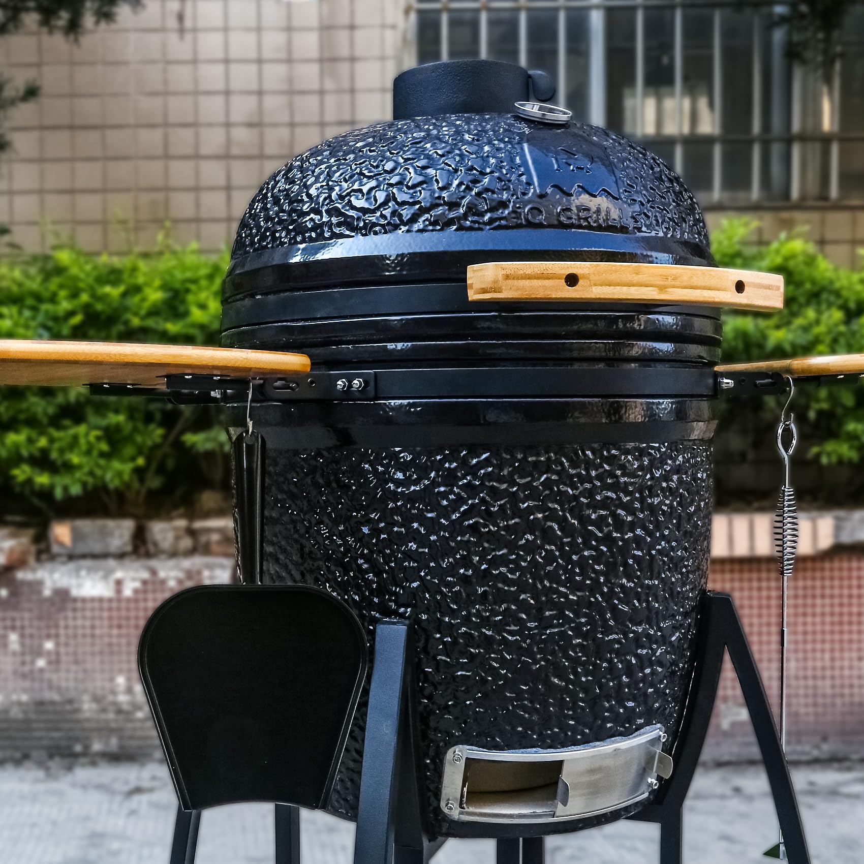 Burly Grill cleanup kit includes ash pan and stainless poker for easy cleanup.
