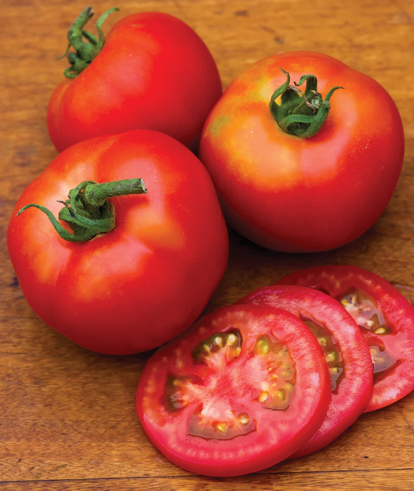 Burpee Early Girl tomato clusters signaling abundant harvests