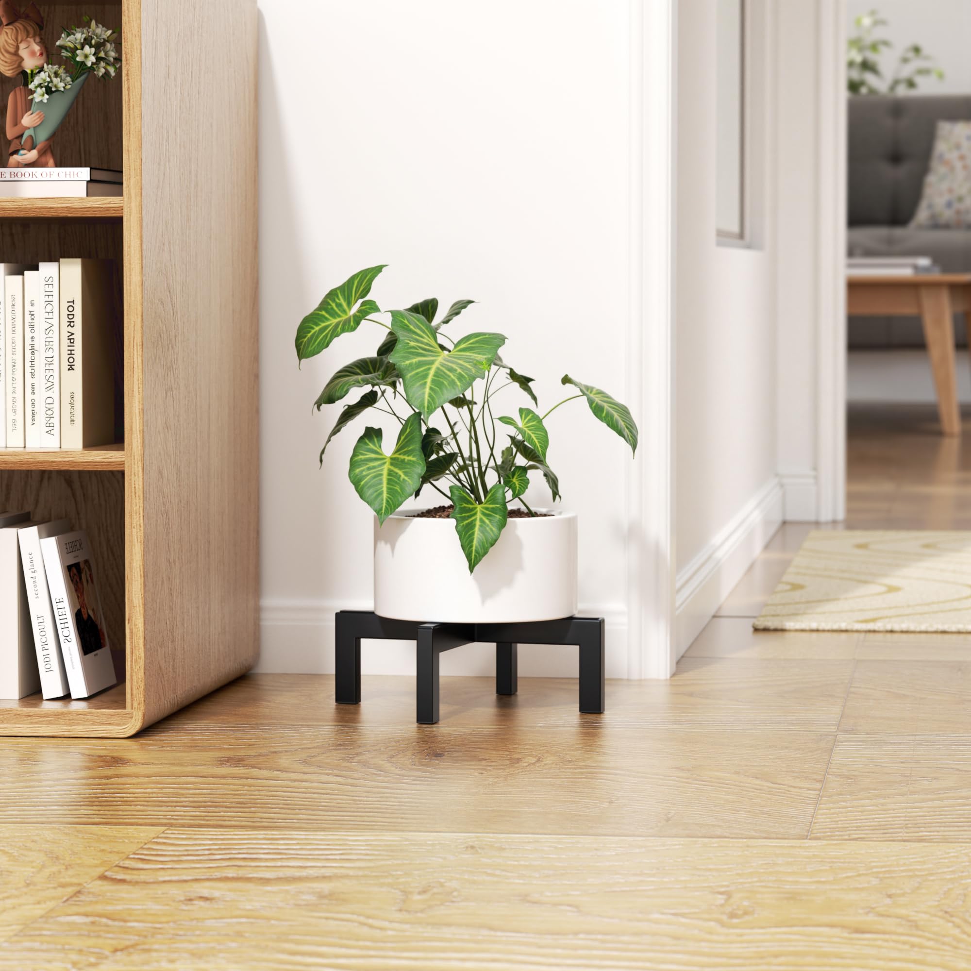 Bussdis plant stand features anti-slip pads for floor protection.