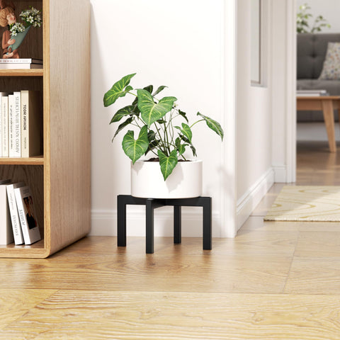 Bussdis single-pot stand fits pots 5–12 inches in diameter.