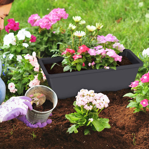 CADUKE railing planter box drainage tray visible with holes for airflow and excess water
