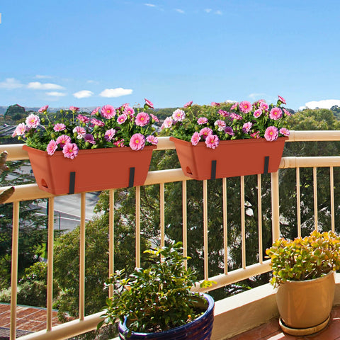 CADUKE hanging planter on railing saves floor space and adds color.