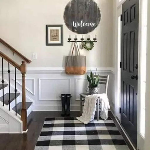 CAINANEL buffalo plaid outdoor rug measures 35.4 by 59 inches for porch and entryway.