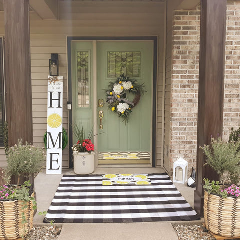 CAINANEL buffalo plaid rug entryway warmly welcomes guests and resists wear.