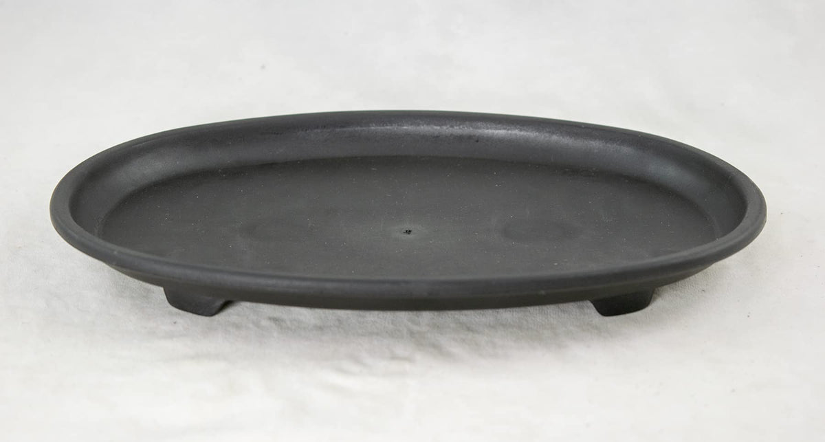 Calibonsai oval black humidity tray top view, ideal for keeping bonsai soil moist.