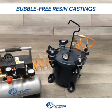 Stable epoxy resin pressure pot with rubber feet for steady casting.