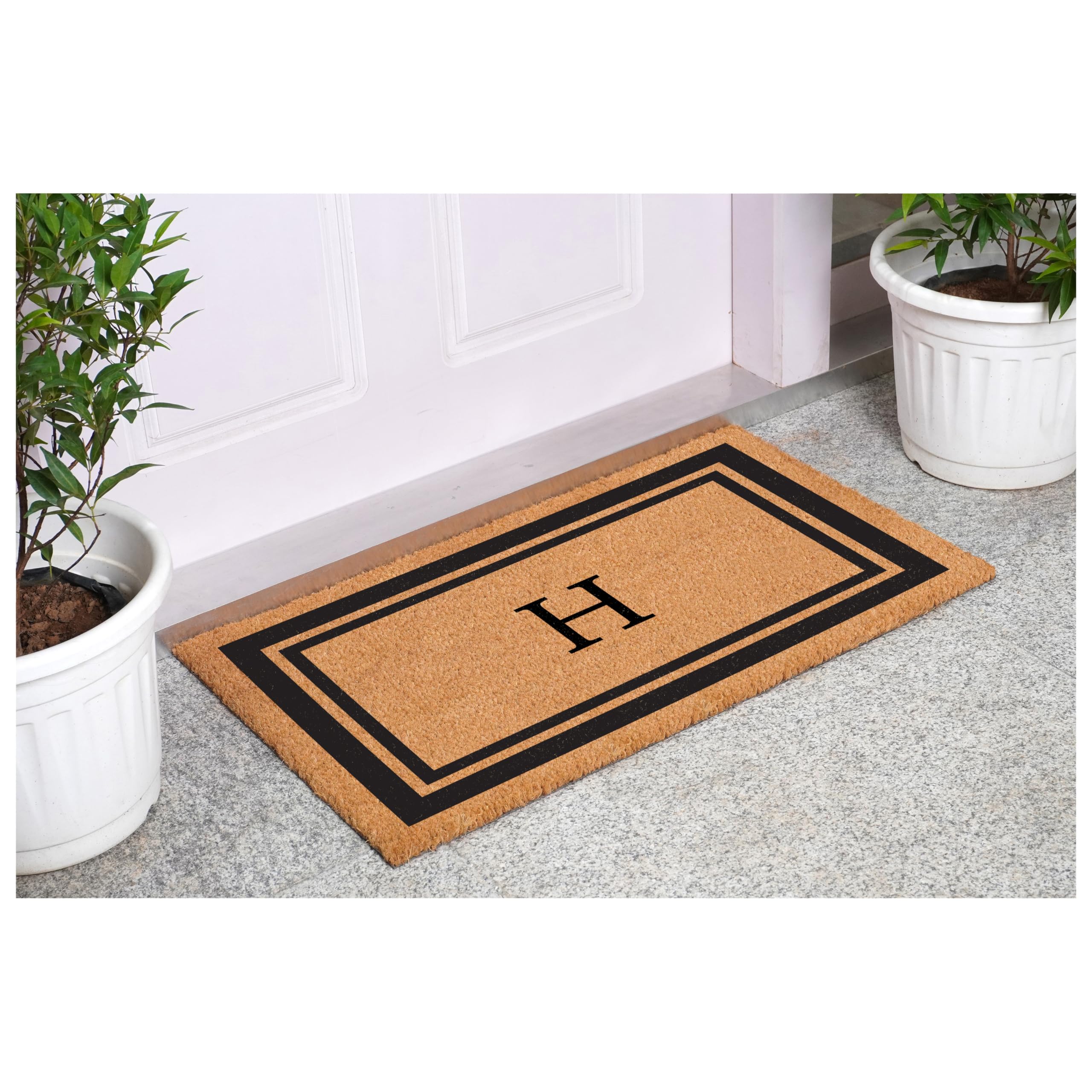 Calloway Mills monogram doormat side angle, durable coir texture for heavy foot traffic.