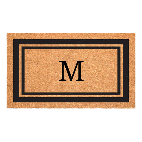 Calloway Mills monogram doormat letter M enhances entry and traps dirt at the door.