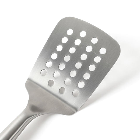 Calphalon Edge navy blue utensil complements modern kitchen decor.