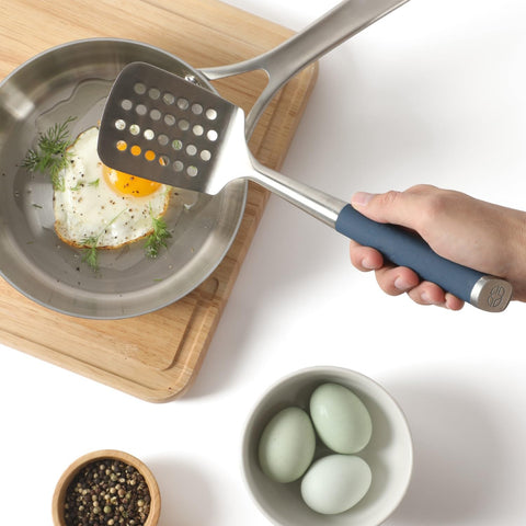 Calphalon Edge perforations drain liquids as you lift foods.