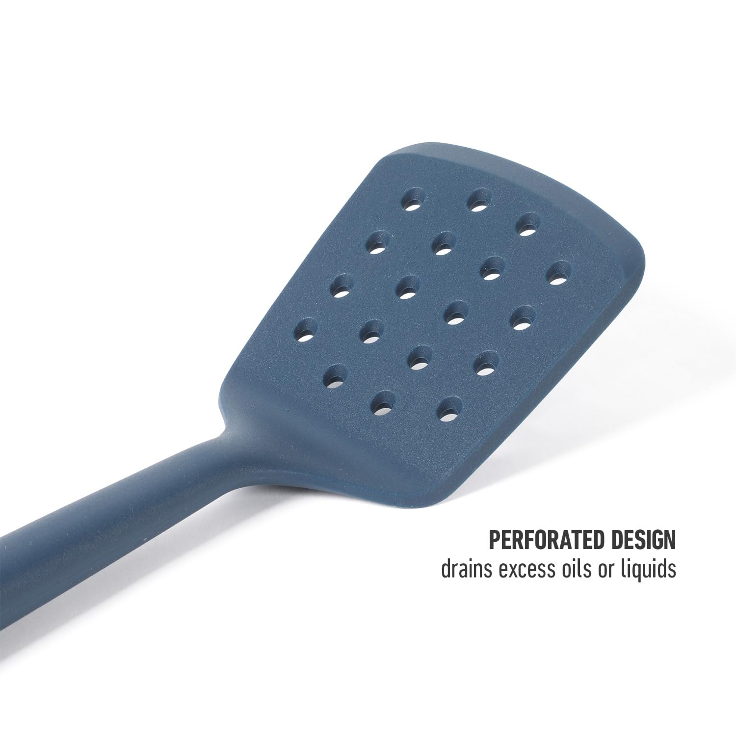 Calphalon Edge navy blue turner resting on pan highlighting non-slip grip
