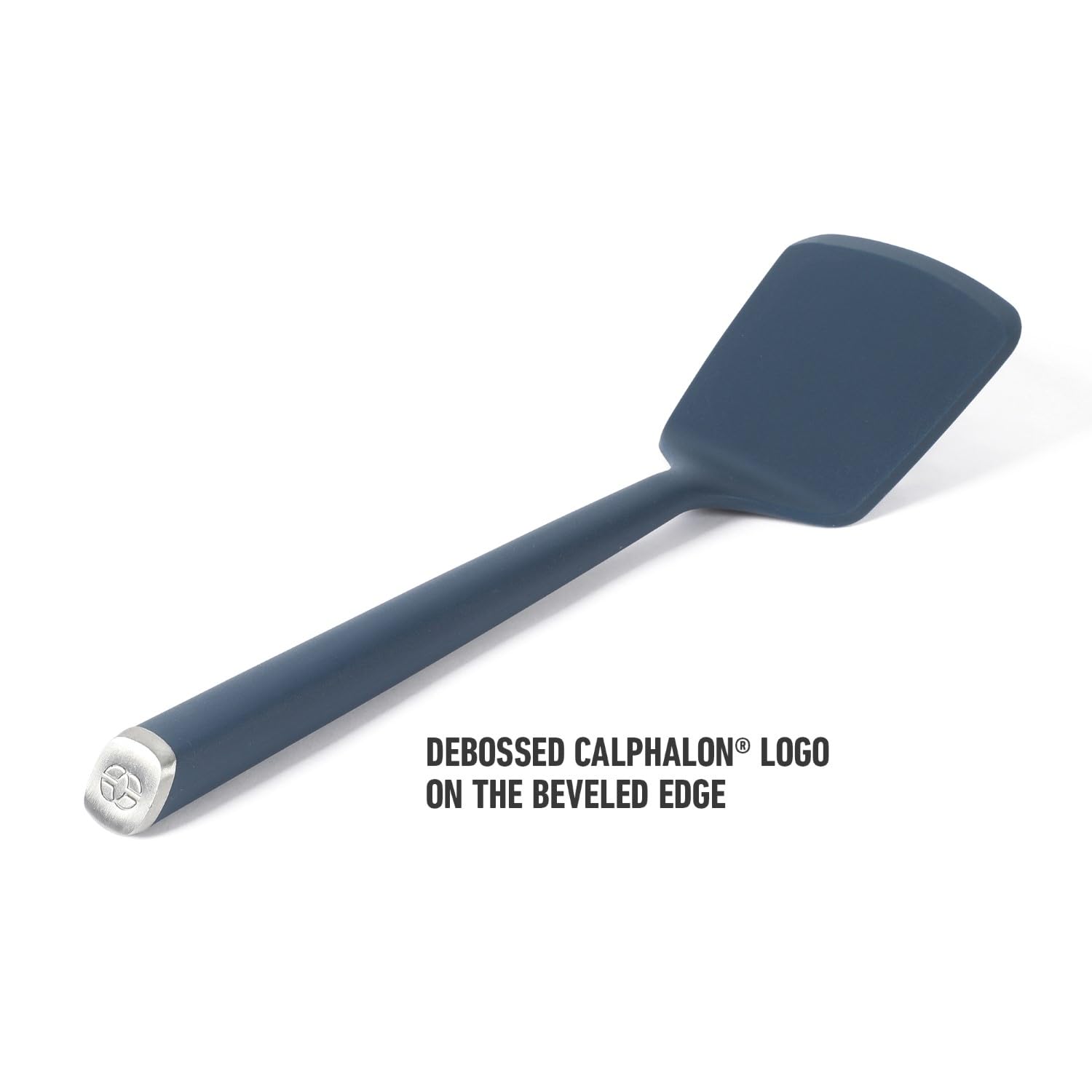 Calphalon Edge navy silicone turner supports quick flips of delicate foods like omelets.