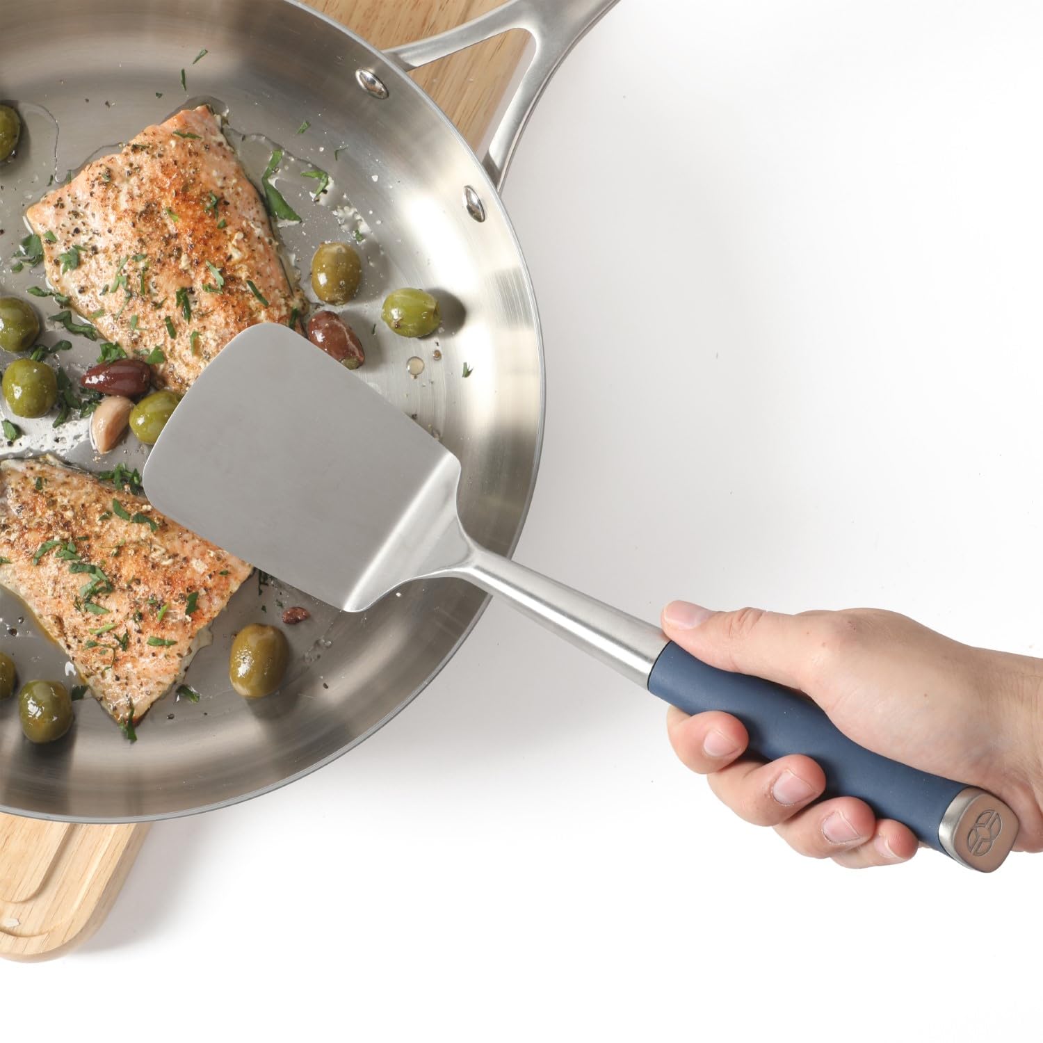 Close-up of Calphalon Edge stainless steel turner blade durability