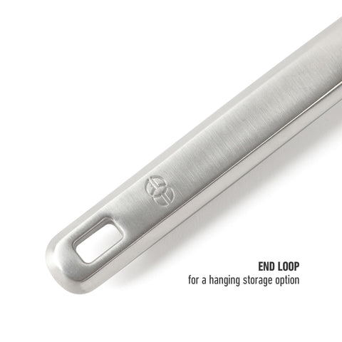 Calphalon Prime slotted turner rests on counter with clean lines and easy-clean appearance.
