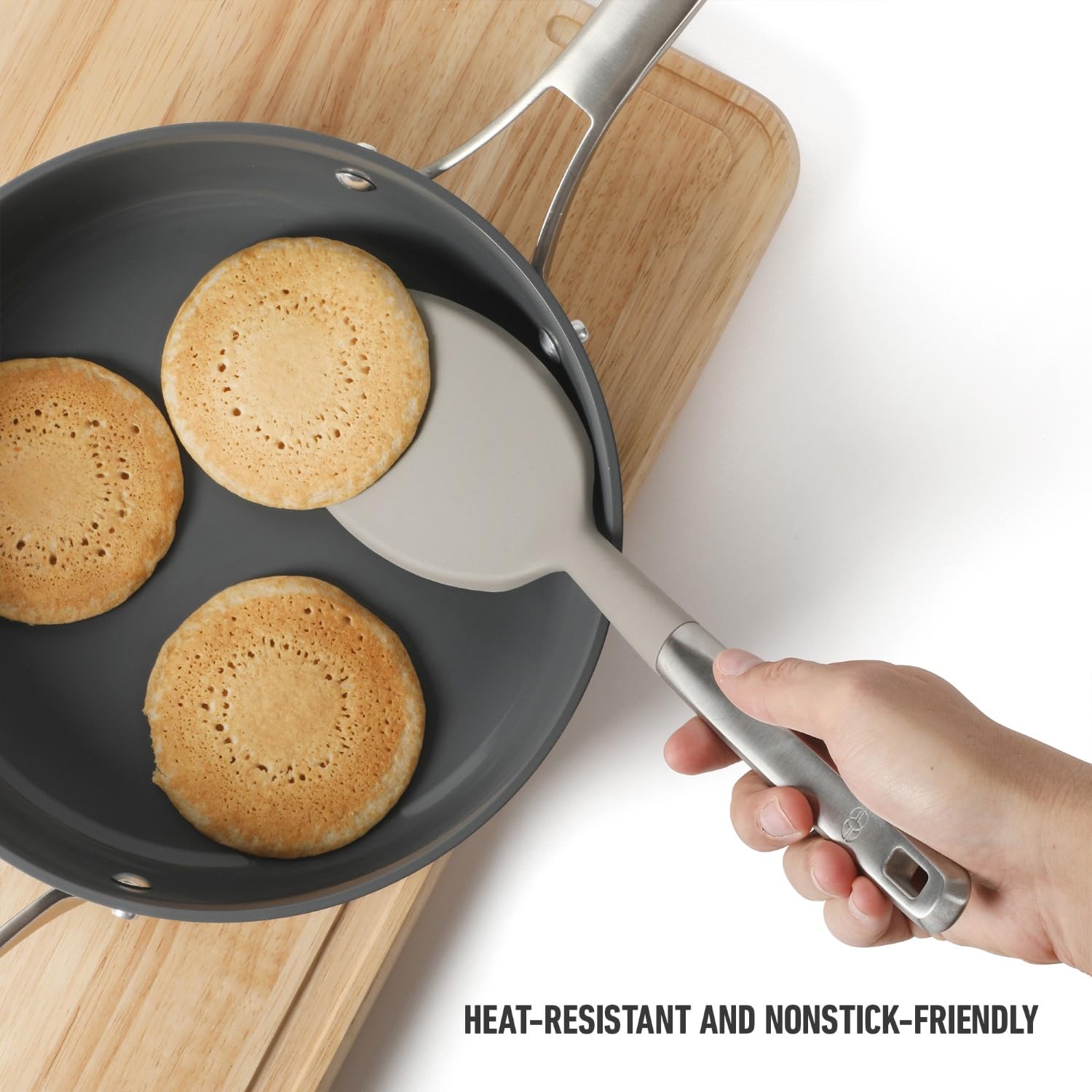 Calphalon Prime silicone head remains heat-resistant for delicate sauces and chowders