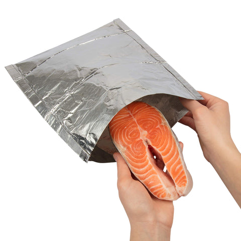 Camerons Mesquite Smoker Bags on grill delivering rich barbecue flavor.