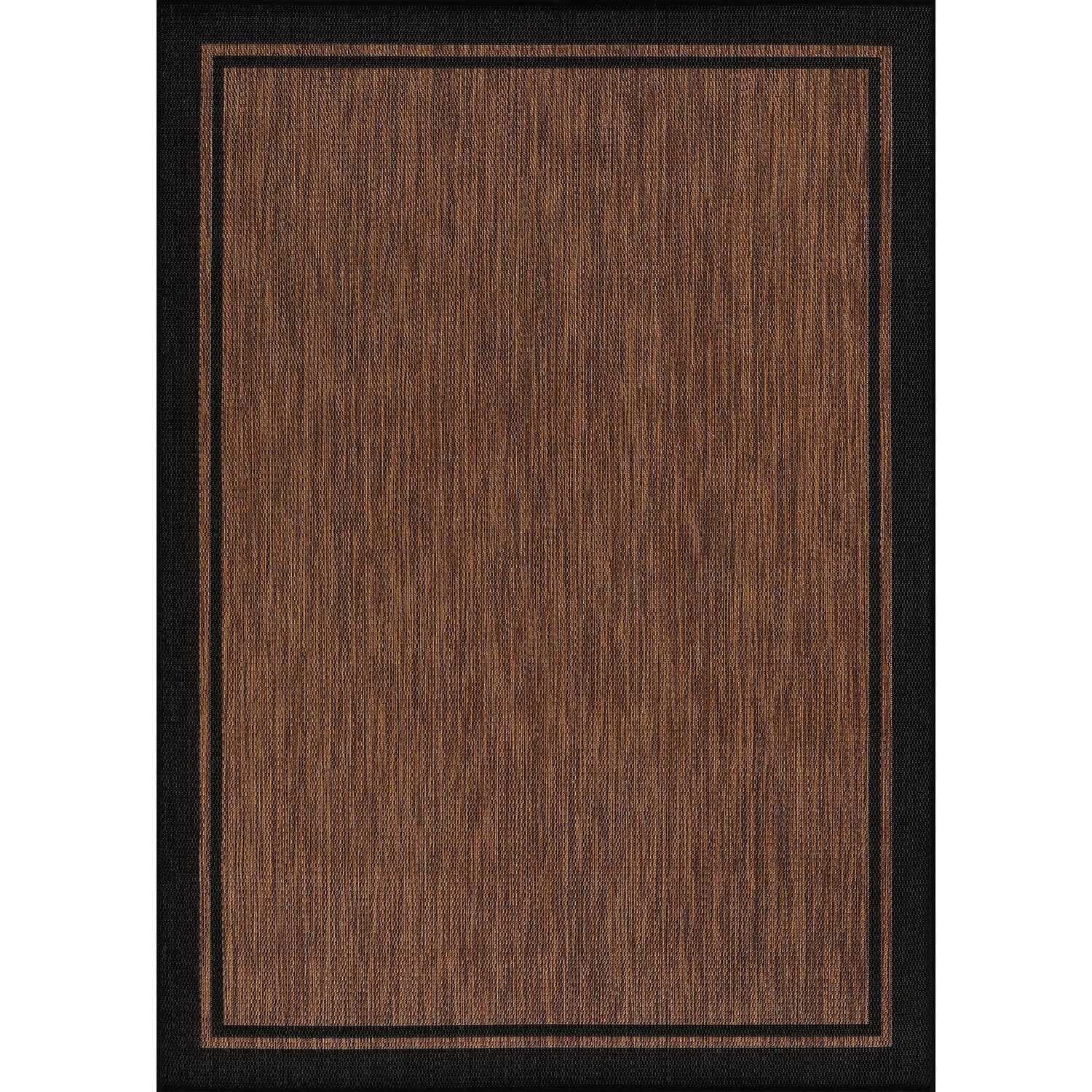 CAMILSON indoor-outdoor rug beside patio deck, easy wash for porch spaces.