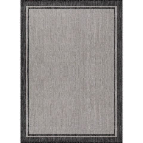 CAMILSON indoor outdoor rug on patio showing grey tones for versatile décor