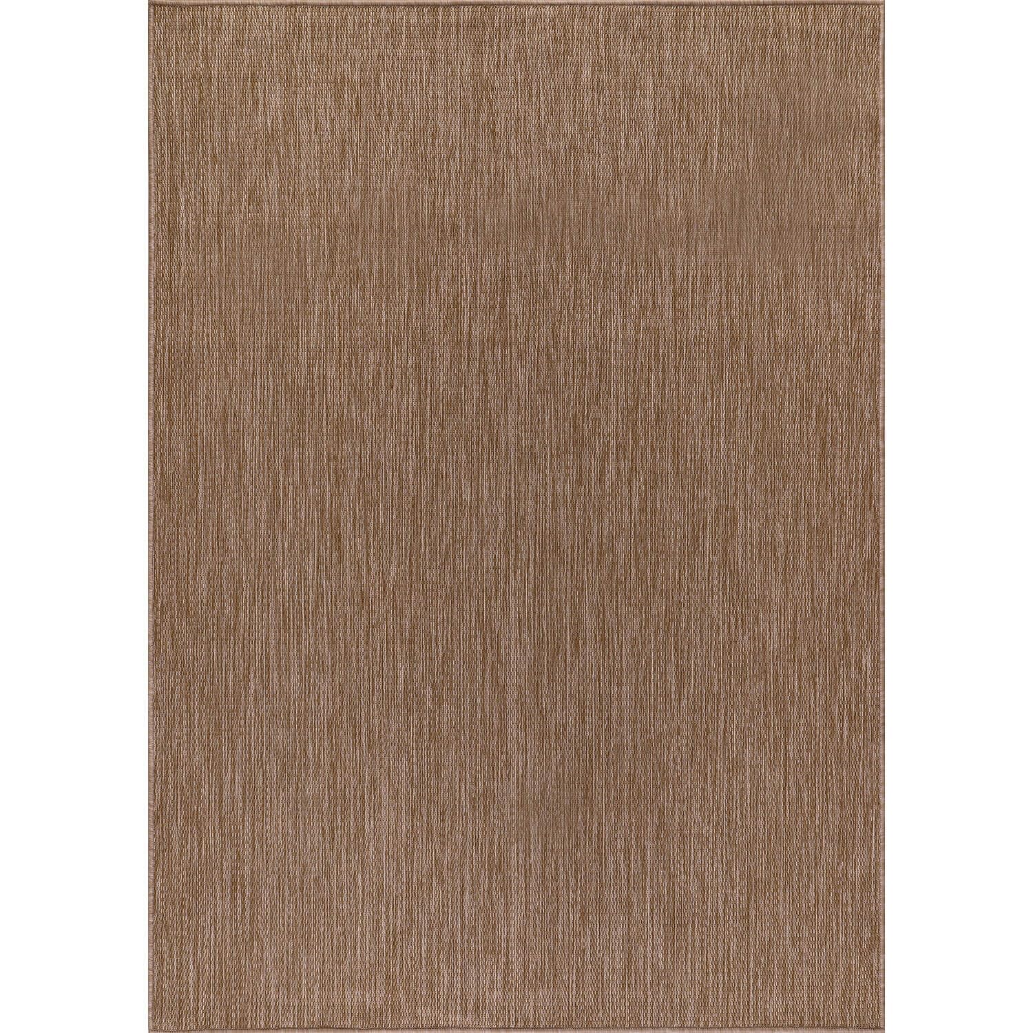 CAMILSON 5x7 black-white rug enhances modern porches while resisting sun fade.