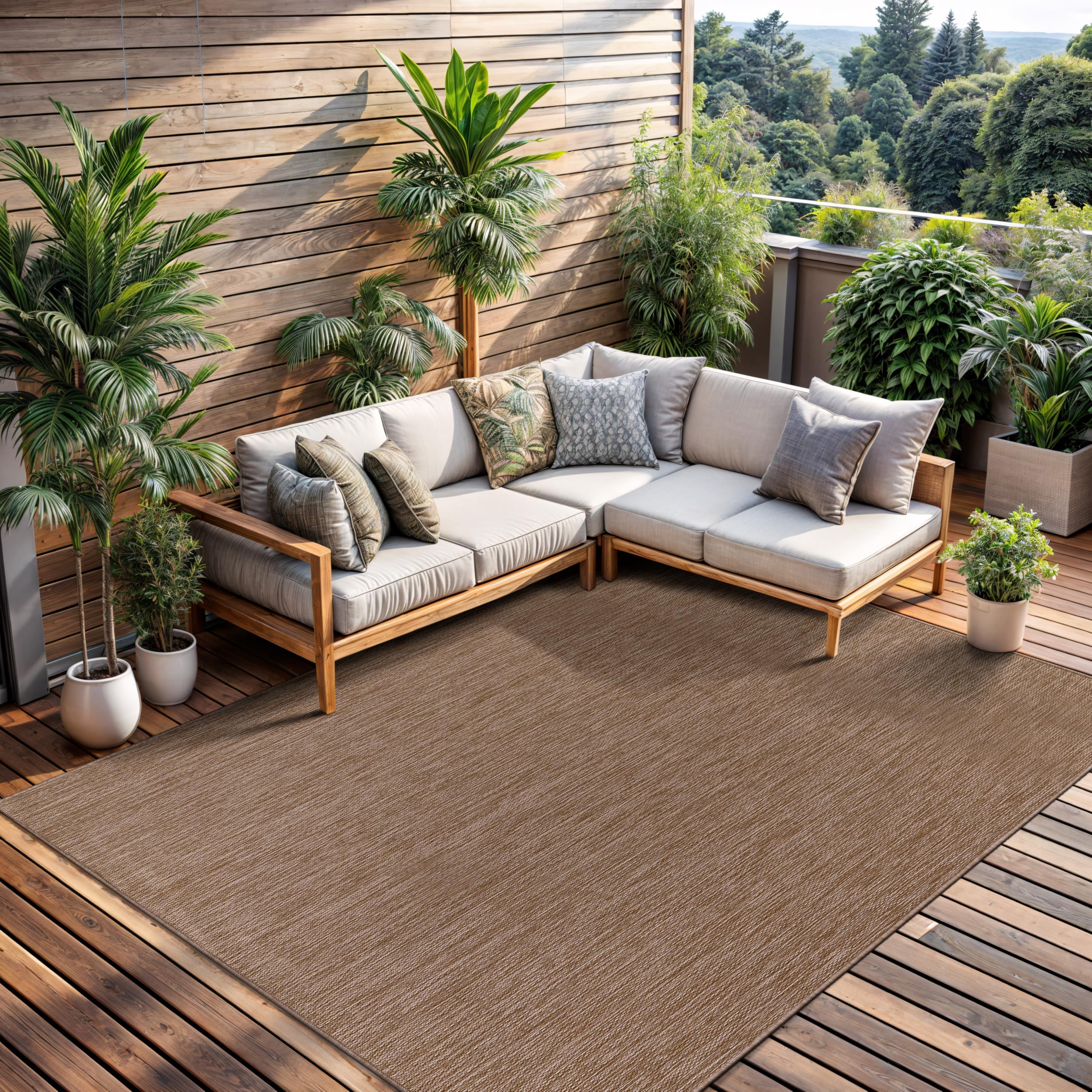 CAMILSON 5x7 patio rug creates inviting terrace ambience while withstanding everyday wear.