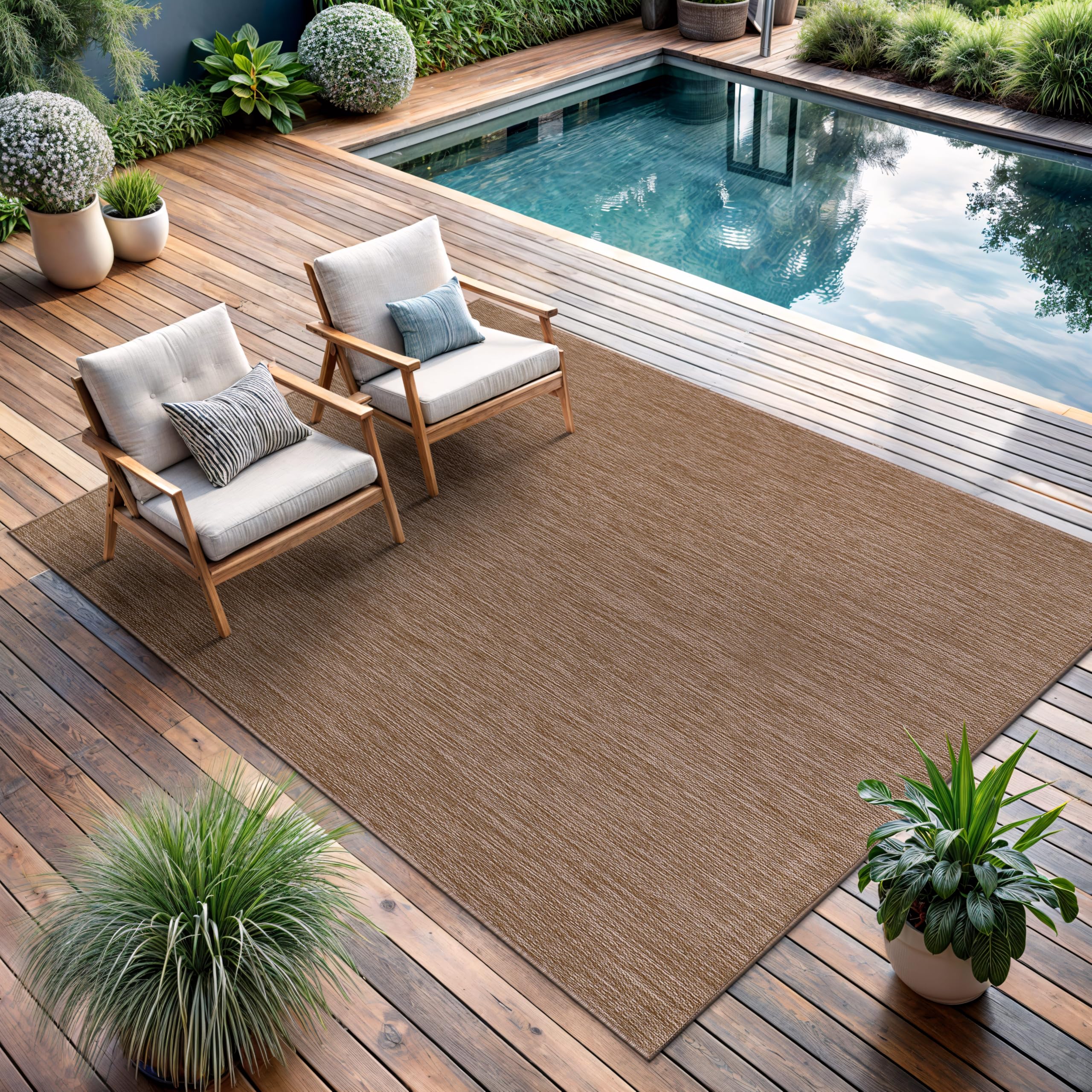 CAMILSON outdoor rug 5x7 UV-protected material stays vibrant in sun-exposed areas.