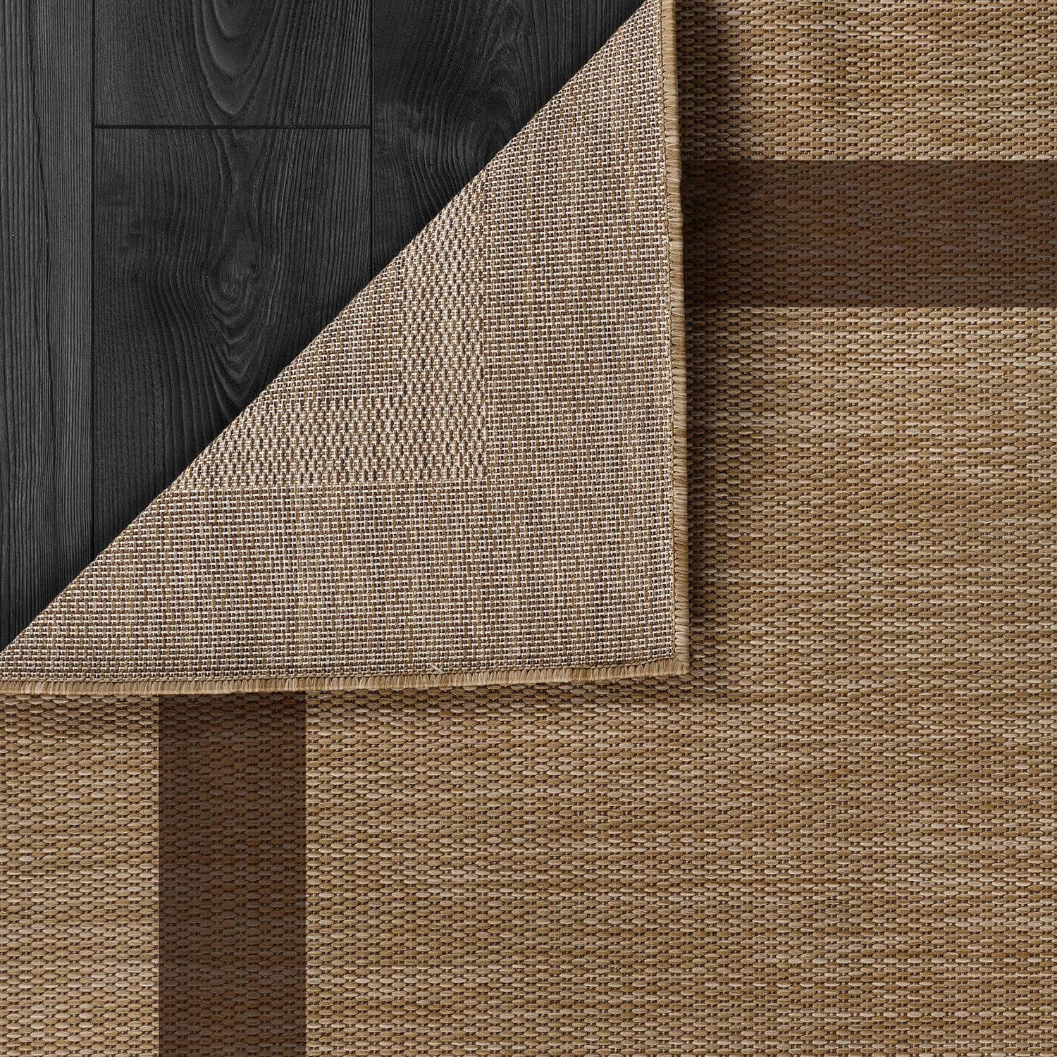 CAMILSON outdoor rug 9x12 on garden path emphasizes UV protection for sunny spaces.