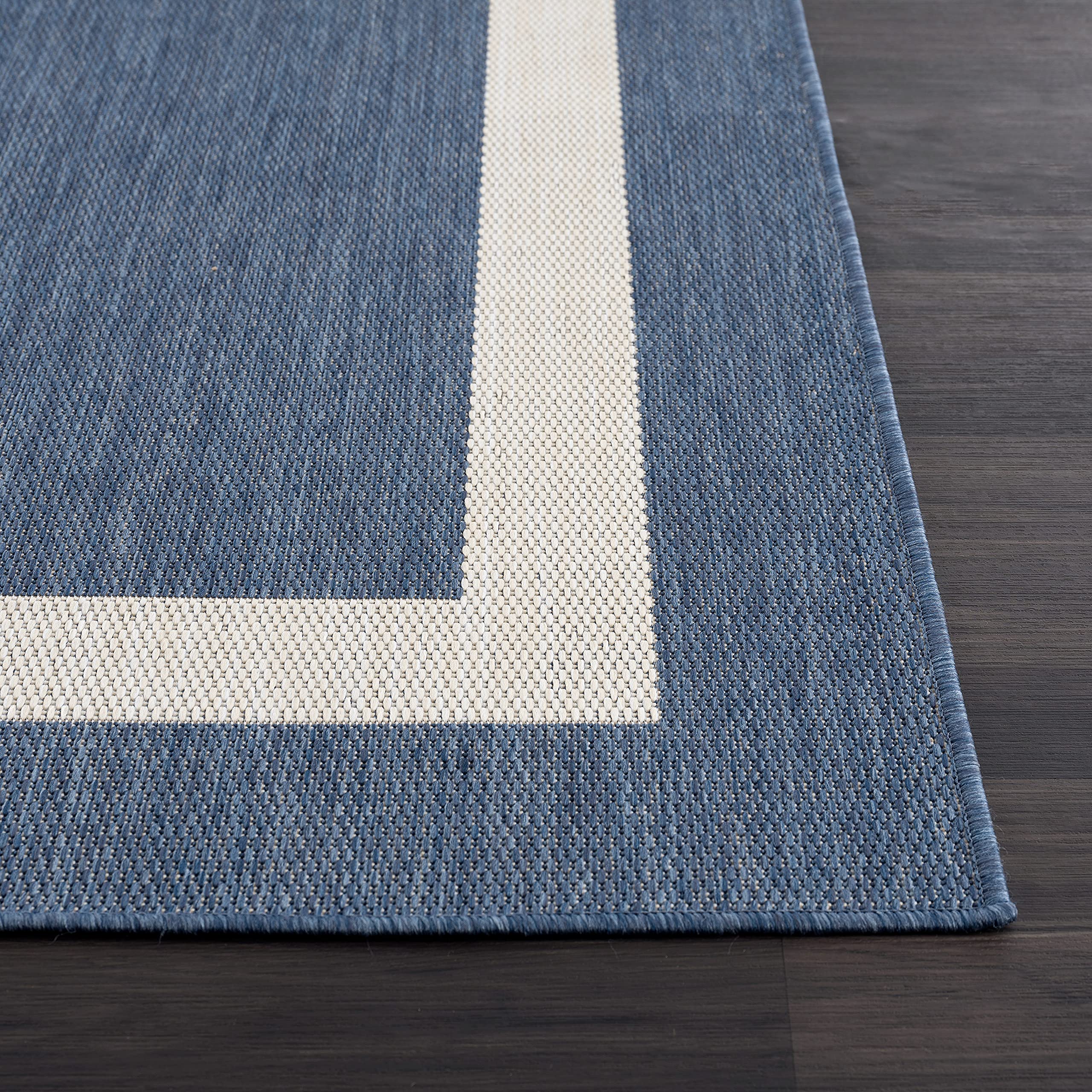 CAMILSON indoor-outdoor rug fits kitchen, balcony, and deck spaces.