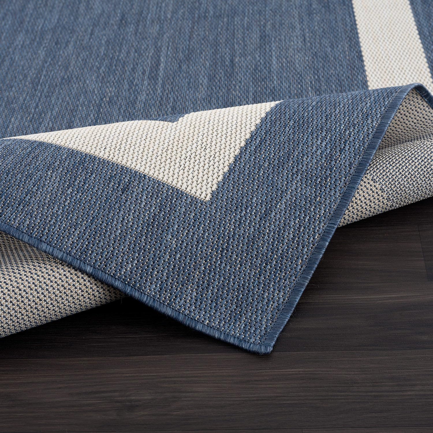 CAMILSON UV-protected outdoor rug retains color after sun exposure.