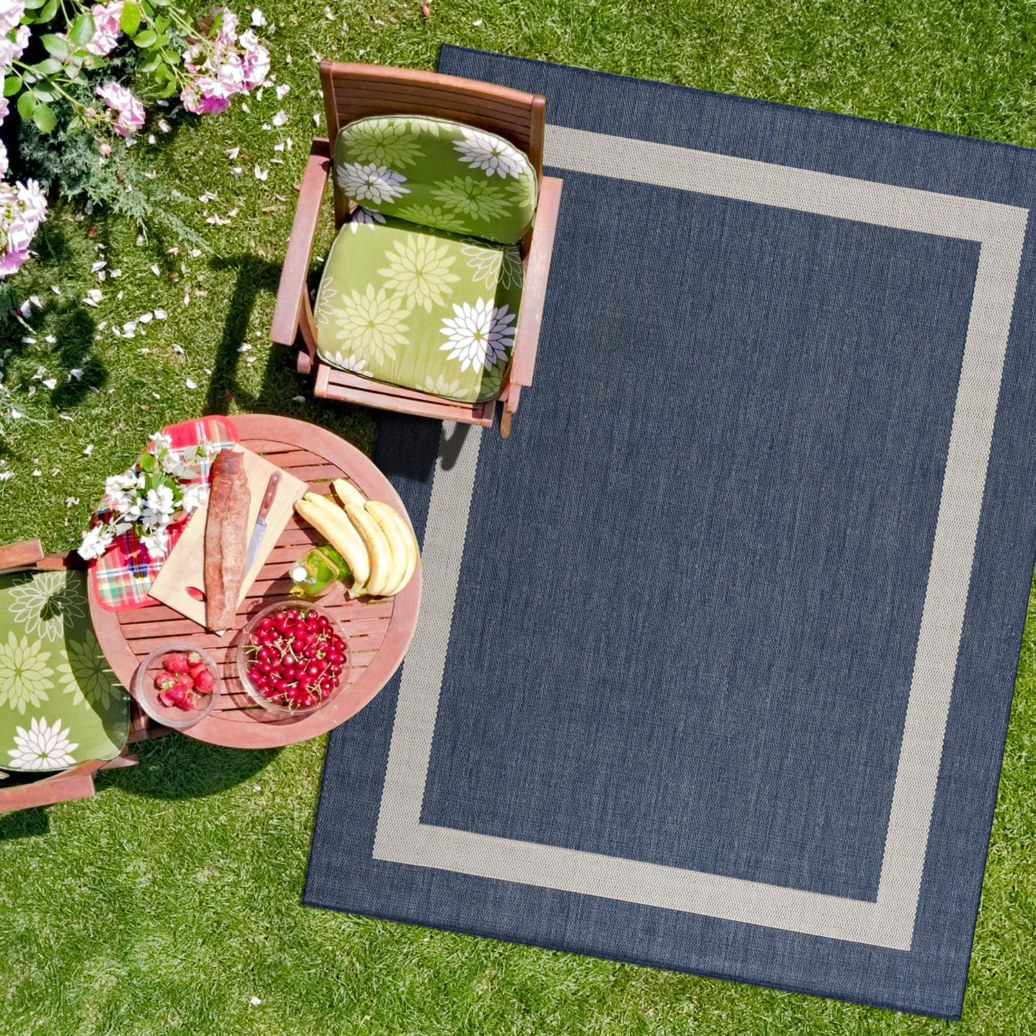 CAMILSON washable outdoor rug easily rinsed with a hose for quick cleanup.