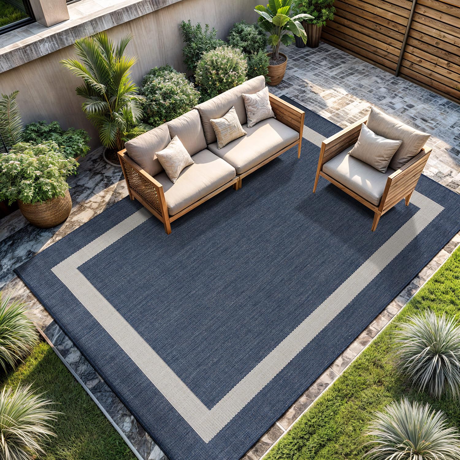 CAMILSON waterproof rug withstands rain and spills while outdoor living.