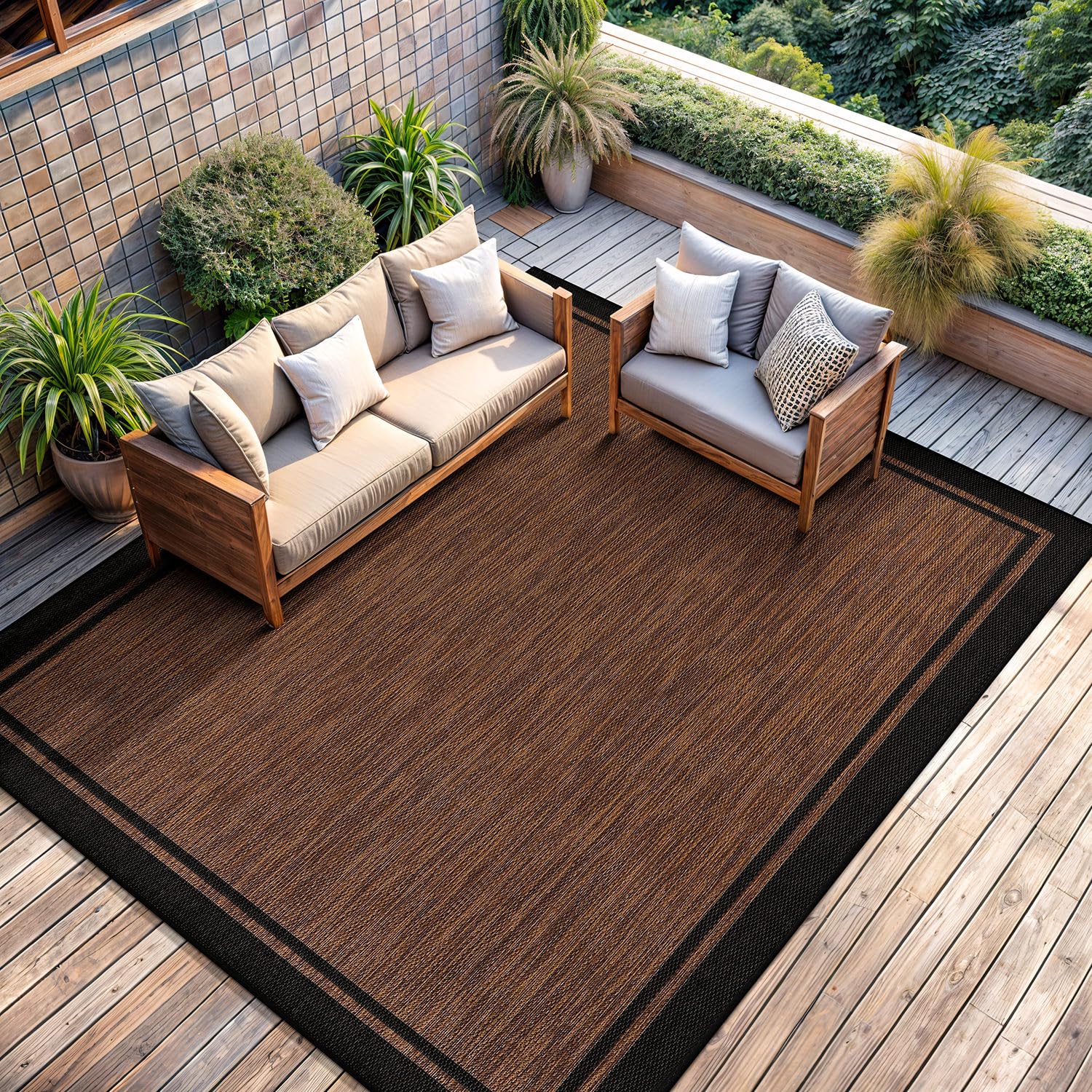 CAMILSON outdoor patio rug with UV protection for sunlit spaces.