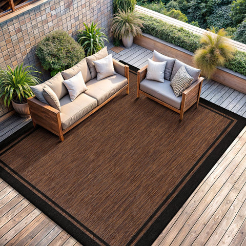 CAMILSON outdoor patio rug with UV protection for sunlit spaces.