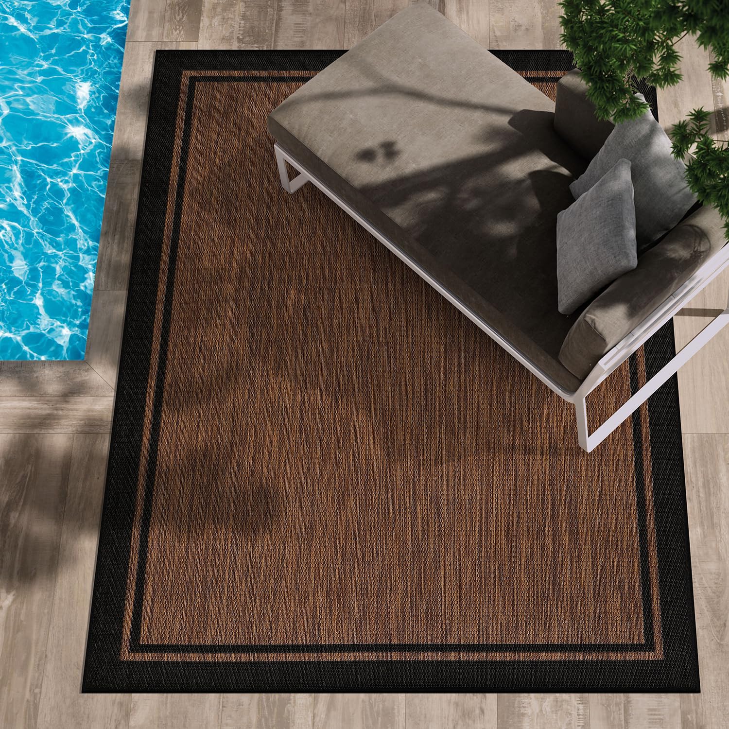 CAMILSON UV-protected outdoor rug resisting sun and fading for outdoor durability.