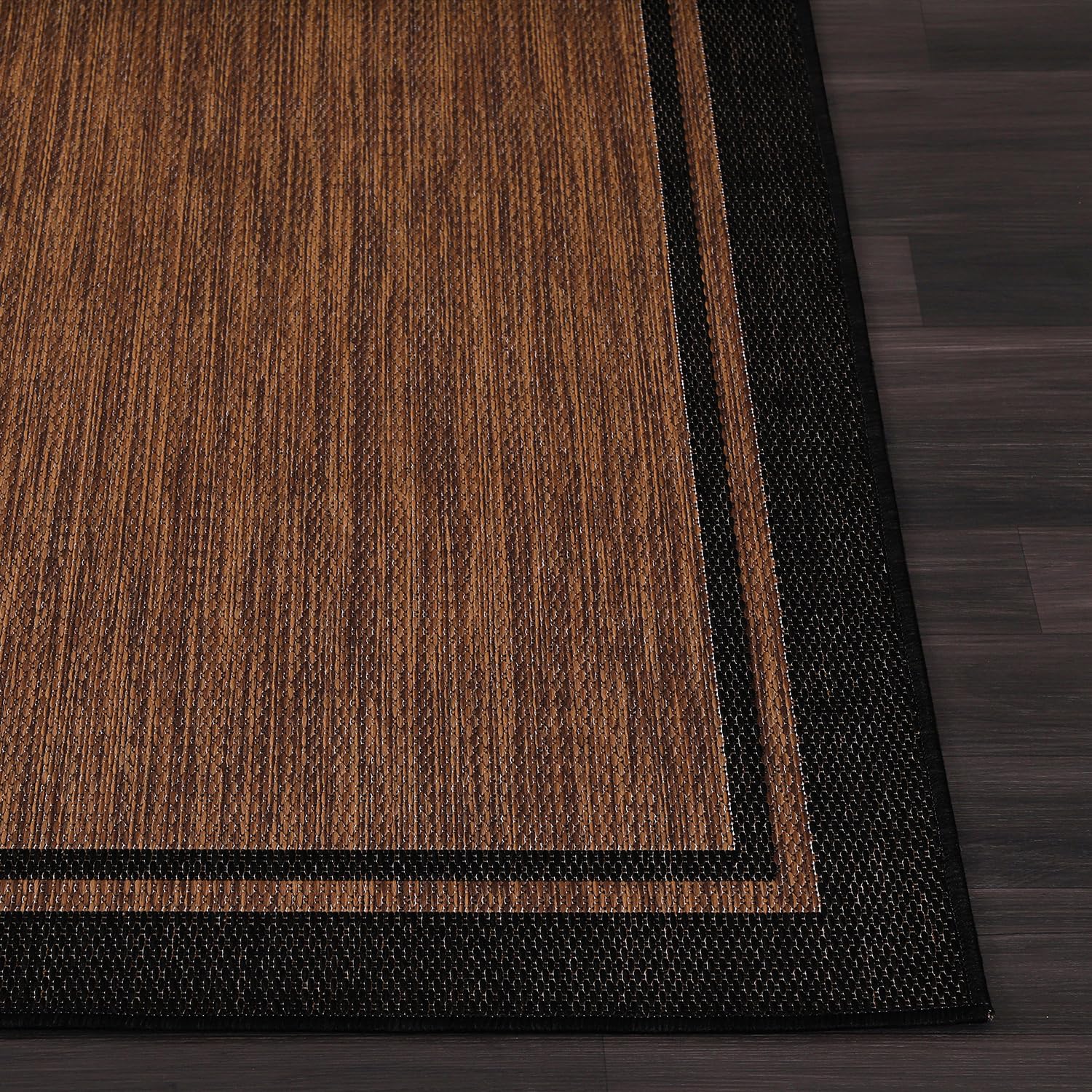 CAMILSON washable rug for quick outdoor cleanup with hose.