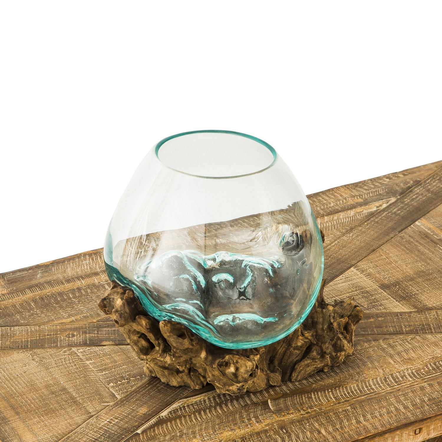 Cape Craftsmen Bali artisans crafted glass enhances any shelf or mantel.