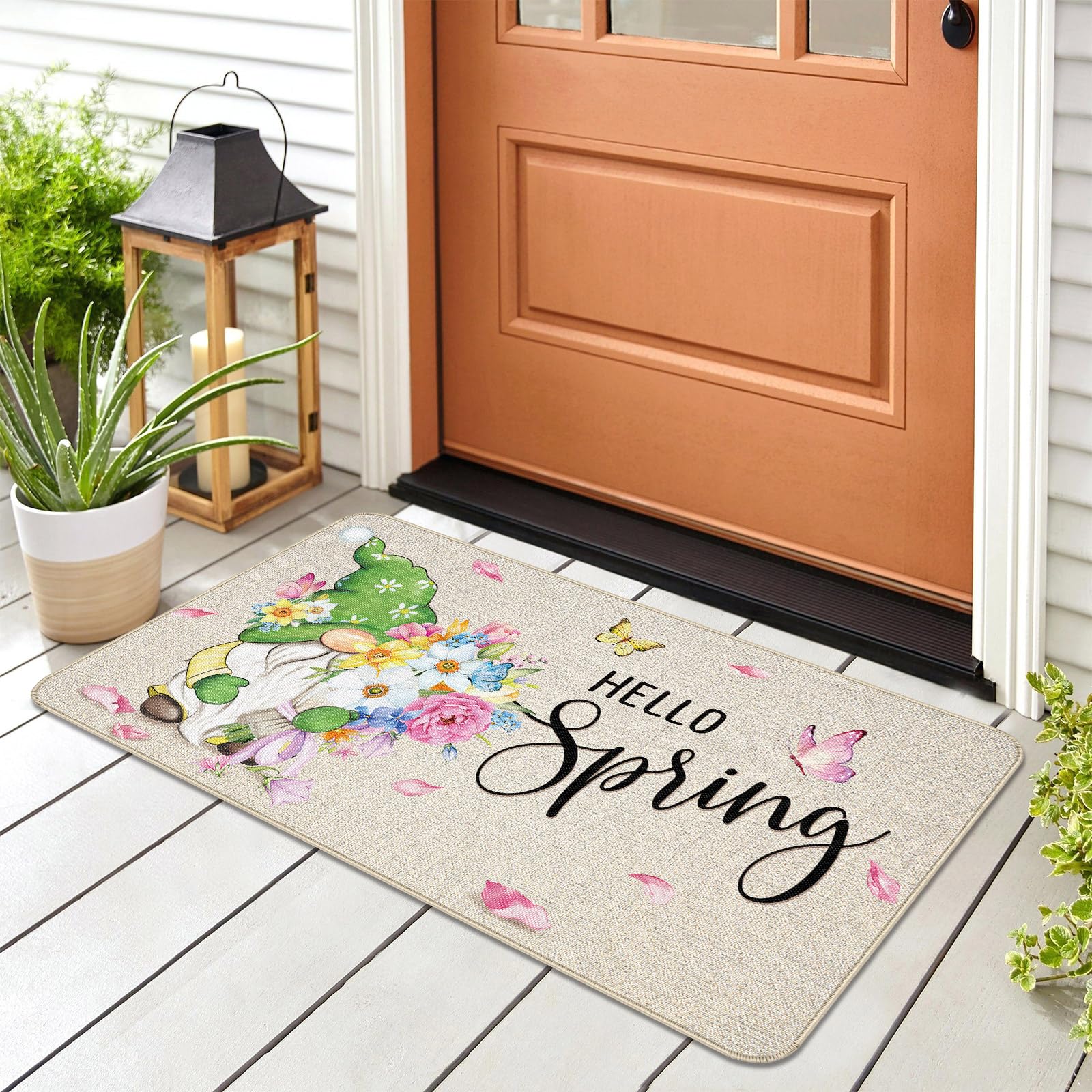 Capoda Hello Spring doormat features floral accents for versatile indoor outdoor entry