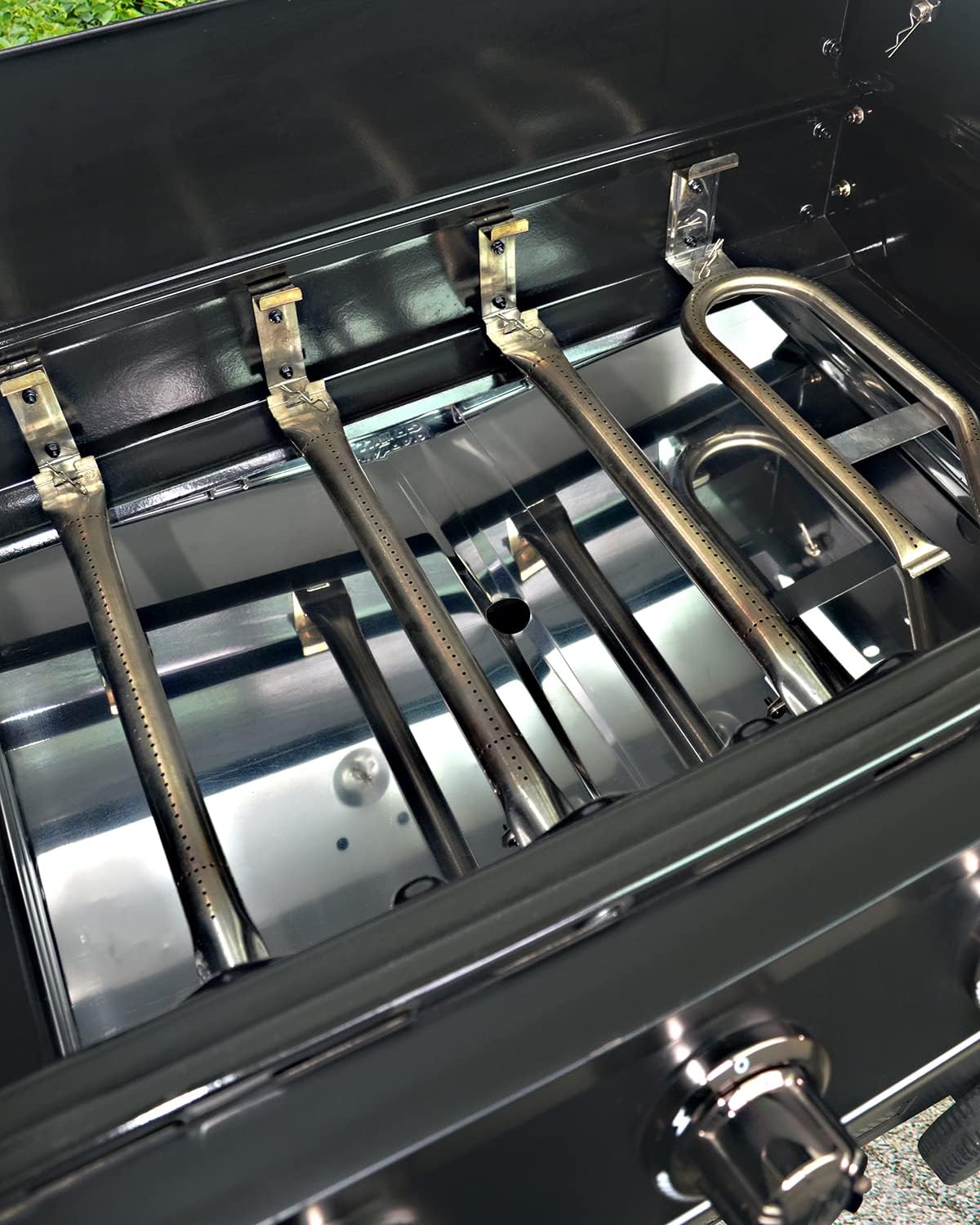 CaptainGrill tray with hidden bottom brackets for no leaks.